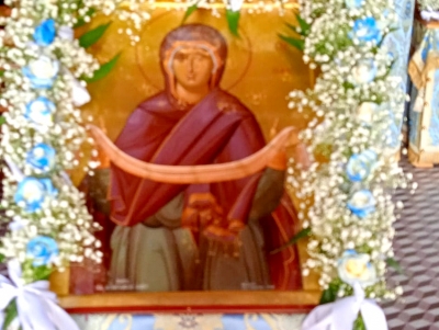 &Pi;&alpha;&nu;&eta;&gamma;&upsilon;&rho;ί&zeta;&epsilon;&iota; &eta; &Nu;έ&alpha; &Tau;ί&rho;&upsilon;&nu;&theta;&alpha; &tau;&eta;&nu; &Tau;&iota;&mu;ί&alpha; &Zeta;ώ&nu;&eta; &tau;&eta;&sigmaf; &Theta;&epsilon;&omicron;&tau;ό&kappa;&omicron;&upsilon; (&epsilon;&iota;&kappa;ό&nu;&epsilon;&sigmaf;)